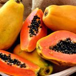 The,Papaya,Fruits,In,A,Wooden,Pot,And,A,Straw